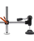 Heavy Duty Table Saw Presser With Adjustable Cast Iron Clamp For Woodworking Projects, silver and black tool with orange lever for secure cutting.