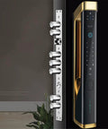 Hassle Free Top Shelf Smart Door Lock With Pretty Slick Fingerprint Scanner App Control Password Entry And Beefy Auto Deadbolt For Secure Modern Homes Easy Install close-up view of sleek black door lock with gold accent and multiple locking bolts.