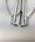 Close-up of a watch hand remover tool replacement part showing durable components for DIY clock assembly.