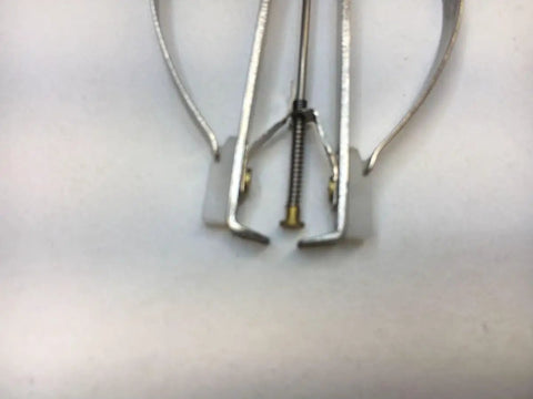Close-up of a watch hand remover tool replacement part showing durable components for DIY clock assembly.
