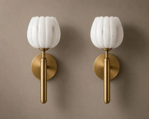 Modern Brushed Brass Wall Sconce Light - Fluted Alabaster Glass Shade Wall Mounted Lamp showcased on a wall with neutral backdrop.
