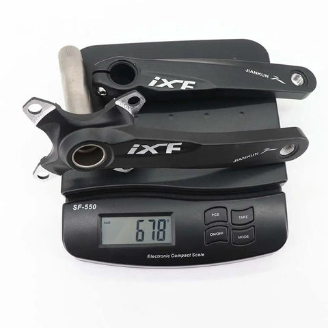 104 BCD Four Arm Mountain Bike Crankset With Chainring And BSA Bottom Bracket Spindle on scale, 678g