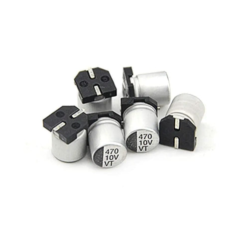 Close-up of 470uF aluminum capacitors from 200 Piece SMD Aluminum Electrolytic Capacitor Kit With Ten Values from 1U to 470U in durable box.
