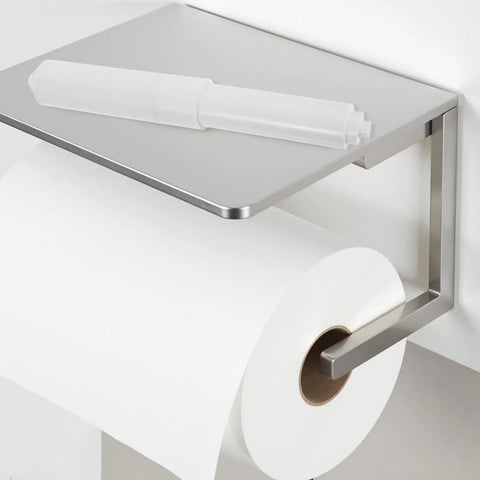 Upgrade Your Bathroom With These 4pcs Plastic Toilet Roll Holder Spindles Featuring Spring Loaded Design For Easy Tissue Dispensing And Strong Durable Performance To Replace Worn Out Parts Perfectly, showing a plastic spindle on a holder.
