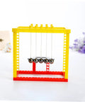 Newton Cradle Balance Balls Kit For DIY Physics Experiments with yellow and red plastic frame