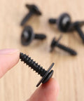 Close-up of Hardcore 40 Pack M4.8 X 17.8 Mm Phillips Truss Head Self Tapping Screws Black Coated Steel Fasteners in hand.