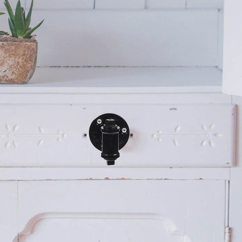Industrial Style Water Pipe Cabinet Pull Handle Two Pack Iron Art Vintage Drawer Knobs for dresser and cupboard doors installed on a white cabinet