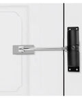 Spring Loaded Self Closing Gate Hinges For Gardens And Fences With Quiet Soft Closing Weatherproof Black Outdoor Gate Hardware Durable Spring Mechanism Easy Install For Sheds And Yard Gates mounted on white door