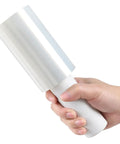 5 Inch X 492 Ft Stretch Roll Handle, Self Adhesive Shrink Film for Packing Moving Storage held in hand with ergonomic grip.