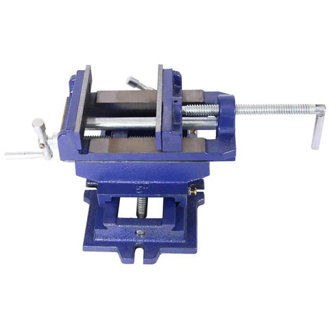 Ironclad 5 Inch Cross Slide Vise For Drill Press And Milling Machines Ultra Heavy Duty XY clamp with serrated jaws on a work table.