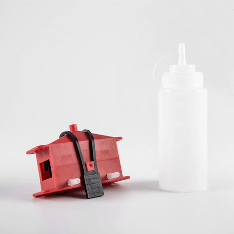 Red chain cleaner and white lube bottle from All Models Motorcycle Chain Cleaning Kit With Lube Device And Brush Gear Cleaner Tool For Chains