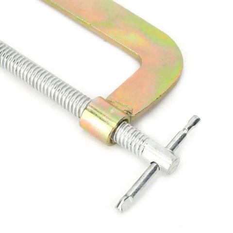 Close-up of Hefty 6 Inch C Clamp For Woodworking And Welding Made From Heavy Duty Heat Treated Carbon Steel, showing screw and handle details.