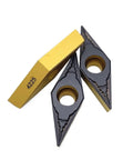 Heavy Duty Carbide Turning Indexable Inserts Vbmt160408 Pm4225 For Cnc Lathe Machine Metal Milling showing three inserts with black and yellow finish.