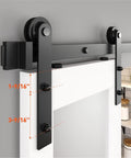 Heavy Duty Sliding Barn Door Roller Hanger With Anti Jumper Stopper Floor Guide And Accessories, black finish, installed view