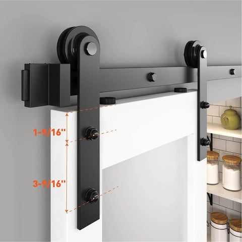 Close-up of 4 Ft Sliding Barn Door Hardware Kit For Single Door - Heavy Duty Black Track System installed on a white door.