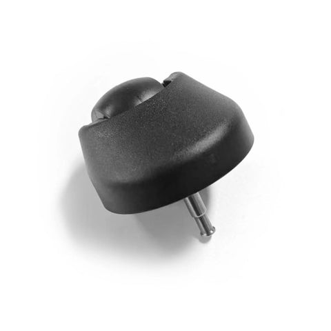 Close-up of front rubber caster wheel with metal axle pin for robot vacuum cleaner