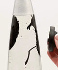 Retro Rocket Ship Ferrofluid Lava Lamp With Magnetic Black Wax In Clear Liquid, 15 Inch Tall, showing magnetic interaction