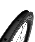 Close-up of Carbon Wheelset For Road Bikes 700C With Front 50mm And Rear 88mm Depth, U Shape 25mm Width, basalt brake surface visible