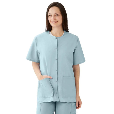 Women Snap Front Jewel Neck Scrub Top Double Cargo Pockets Misty Medium Cotton Polyester Blend Top in light blue worn by a smiling model.