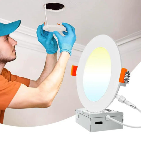 DAYBETTER 6 Inch 5 CCT Led Recessed Ceiling Light with Junction Box installed by a person wearing gloves.