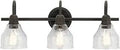 Three Light Vanity Light 24 Inch In Olde Bronze With Clear Seeded Glass Wall Mount Fixture For Bathrooms In Modern Transitional And Traditional Styles With Elegant Ambient Lighting That Complements Any Decor Style