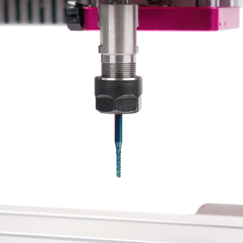 CNC router end mill, blue-coated, in ER16 collet on spindle (close-up).