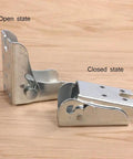 Heavy Duty Galvanized Steel Self Locking Hinge Brackets For Folding Desks And Couches showing open and closed states on wood surface.
