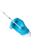 Premium 100 Pack 1Ml Luer Lock Syringes With 25Gauge Needles, Heavy Duty Industrial Disposables in hand with glove.