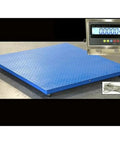Built Like A Tank Heavy Duty Industrial Floor Scale With 10000 Lb Capacity And Straight Up Dead On One Pound Readability Digital Platform For Shipping Freight And Pallet Weighing 48 By 48 blue platform with digital readout.