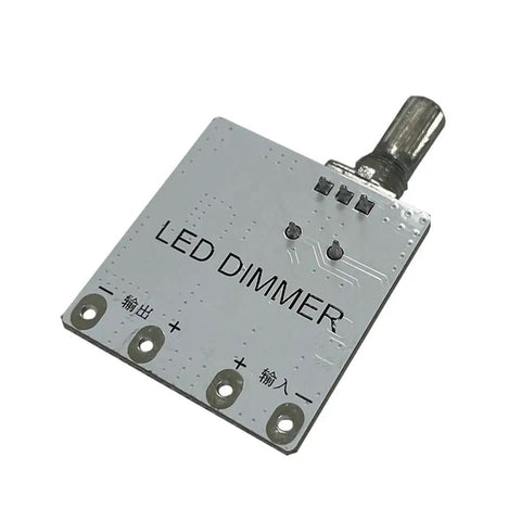 Top Notch LED Constant Voltage Dimmer Board For Desk Lamps With 0 To 100 Percent Stepless Smooth Fade Control And No Flicker For Live Streaming Gear Or Any DC 3.7V To 24V Setup Powering Lithium Batteries Easily With Blue Light Indicator. Close-up view of the dimmer board showing controls and connections.