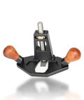 Front view of a handheld woodworking router plane with black base, wooden side handles, and adjustable depth rod.