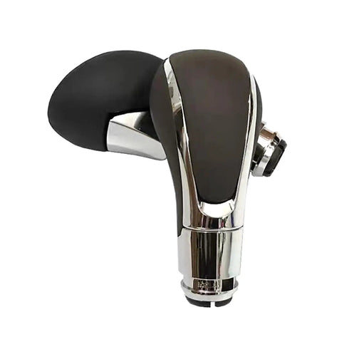 Upgrade Your Drive With This Durable Car Interior Shifter Head Transmission Gear Shift Lever Knob That Boasts A Super Comfy Grip And Sleek Metal Plastic Build For Easy Direct Install No Mods Needed On Many Models. Black metal plastic car gear shift knob with chrome trim, side view