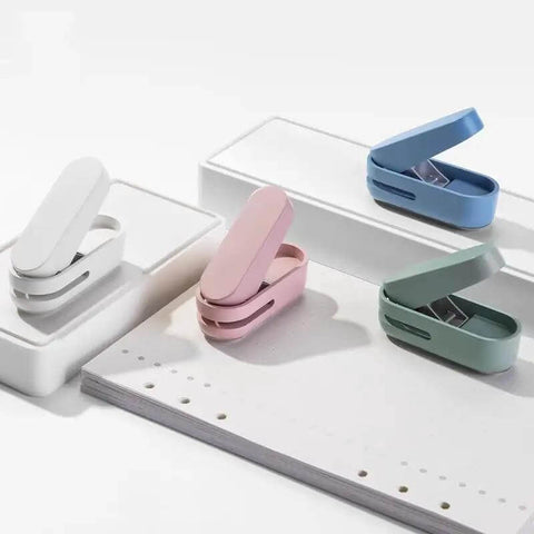 Compact Blue Hole Puncher For 10 Sheets Tiny Single Hole Puncher For Office with colorful options displayed on white background