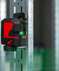 Knockout Green Beam Cross Line Laser Level For Hella Visible Layout Marks And Super Sharp Wall Grids With Effortless Drywall Tiling Setup On Tough Jobs mounted on a metal frame.