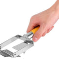 Hand holding Stainless Steel Beehive Knife Scraper and Honey Uncapping Fork for Beekeeping Equipment, Pro Grade Honey Extraction Tool