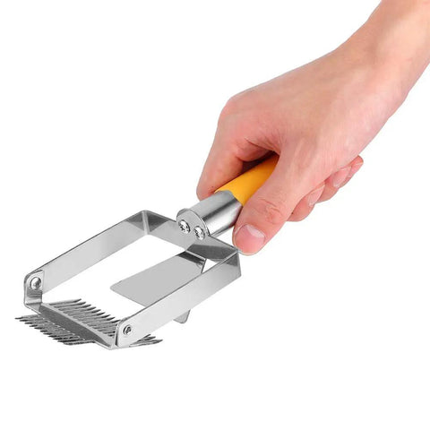 Hand holding Stainless Steel Beehive Knife Scraper and Honey Uncapping Fork for Beekeeping Equipment, Pro Grade Honey Extraction Tool