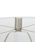 Close-up of the metal frame of Reeded Glass Table Lamp With Metal Base In Antiqued French Silver Mercury Glass Finish, White Linen Drum Shade, 30 Inches Tall, Classic Yet Modern Vibe For Living Room Or Bedroom.