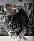 Man using a Killer 1200W Plunge Cut Circular Saw With Blazing 5200 RPM Speed And Compact Build for precise wood cuts on guide rails.