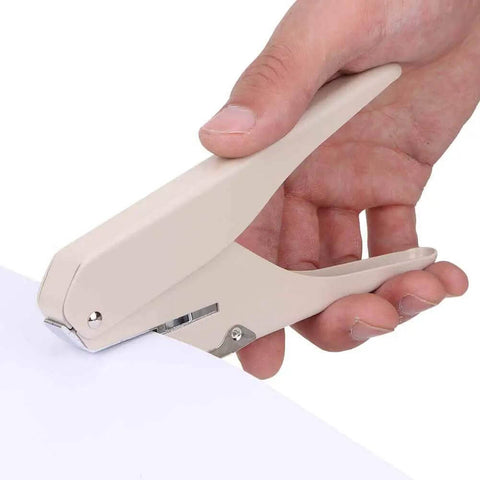Hand using Mushroom Hole Puncher 6 Sheet A4 Capacity, Mushroom Shaped Paper Punch For Office School And Craft on paper