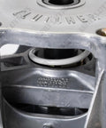 Front close-up of Polaris RZR primary clutch in metallic housing with visible spring