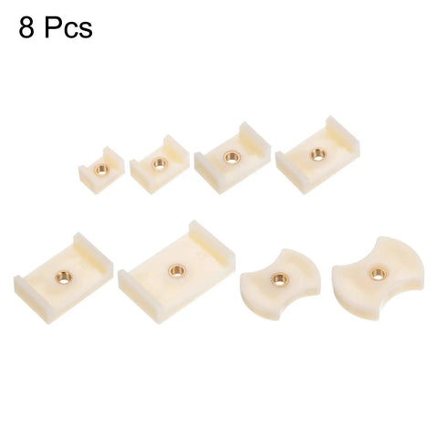 8 Piece Watch Case Press Die Kit With Nylon Fitting Dies for Tabletop Capping Machine Watch Repair Gear designed for quick safe back cover inserts visible in various sizes of ABS plastic.