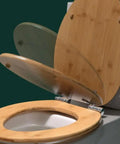 Top Shelf Thickened Toilet Seat With Quiet Drop Lid And Contoured Wooden Cushion For Chic Home Bathrooms No Sweat Setup Plus Heavy Duty Soft Close guarantees quiet operation with a bamboo finish.