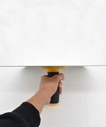 Hand holding Aluminum Plastering Hawk With 300x300 mm Mortar Board Holder And Soft Grip Handle, seen from side