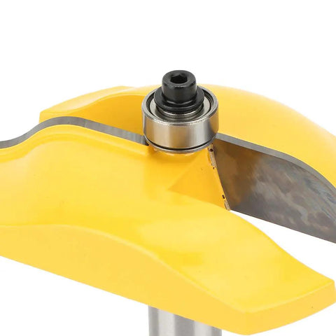 Close-up of Pro Grade Cove Raised Panel Router Bit Half Inch Shank Cemented Carbide with yellow coating.
