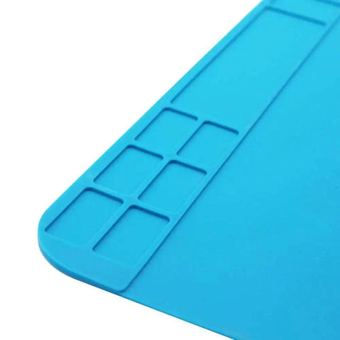 Close-up of blue Two Pack Silicone Soldering Mat For Electronics Repair Workstation With Grids Pro Grade Anti Static Durable Pad