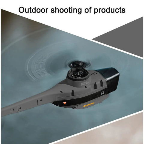 Remote Control Helicopter With 2.4G Four Channel Aerial Recon Drone Crash Resistant Single Rotor Model For Adults close-up in flight.