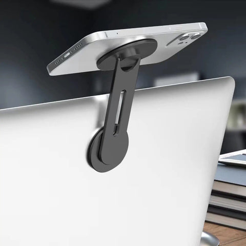 Ultra Thin Aluminum Laptop Phone Holder With Magnetic Quick Mount attached to laptop with phone, silver color.