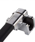 Close-up of the motion activated steering wheel lock featuring a durable steel clamp, part of a security system for vehicles.