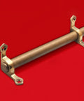 Vintage Brass Adjustable Stair Runner Rods With Non-Slip Design For Elegant Carpet Runners Complete Kit Including Brackets Screws And End Caps For Easy Removal And Secure Floor Mat Bar Installation. Brass stair runner rod with brackets on red background.