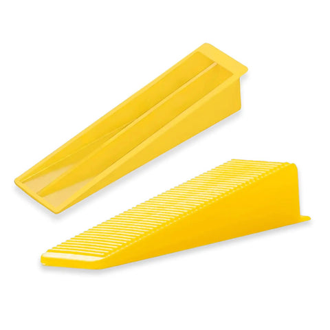 Yellow reusable tile leveling wedges for DIY installations durable 1000 piece leveling system kit with spacers, close-up view.